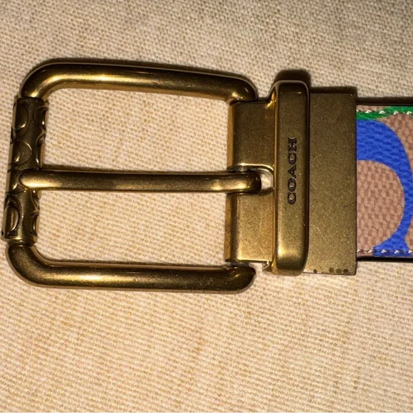 Roller Buckle Reversible Belt
In Rainbow Signature Canvas - Picture 7 of 13